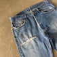 Vintage Levi’s 501 Distressed Denim Jeans