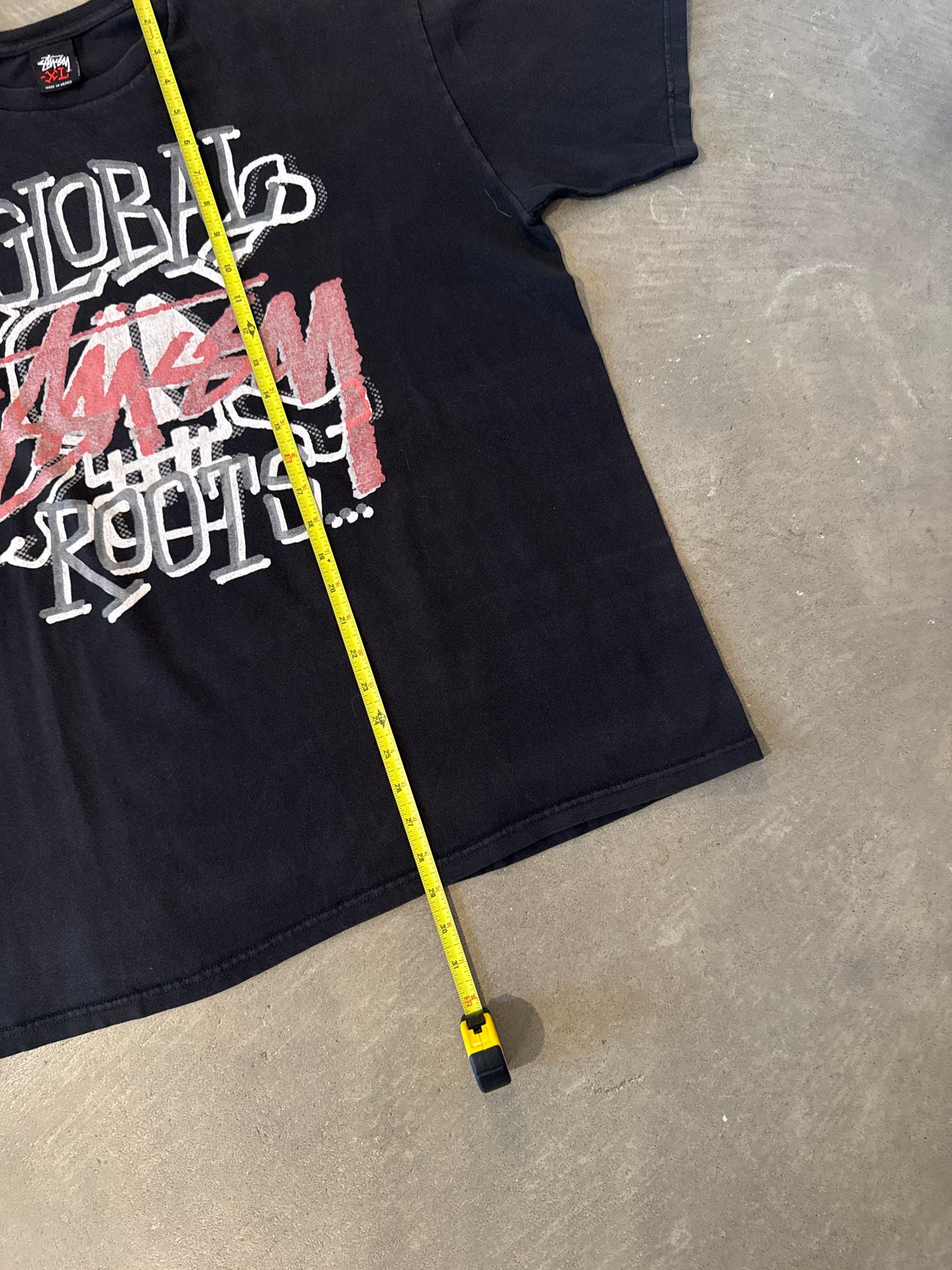 Vintage Stussy Global Roots Skull Tee