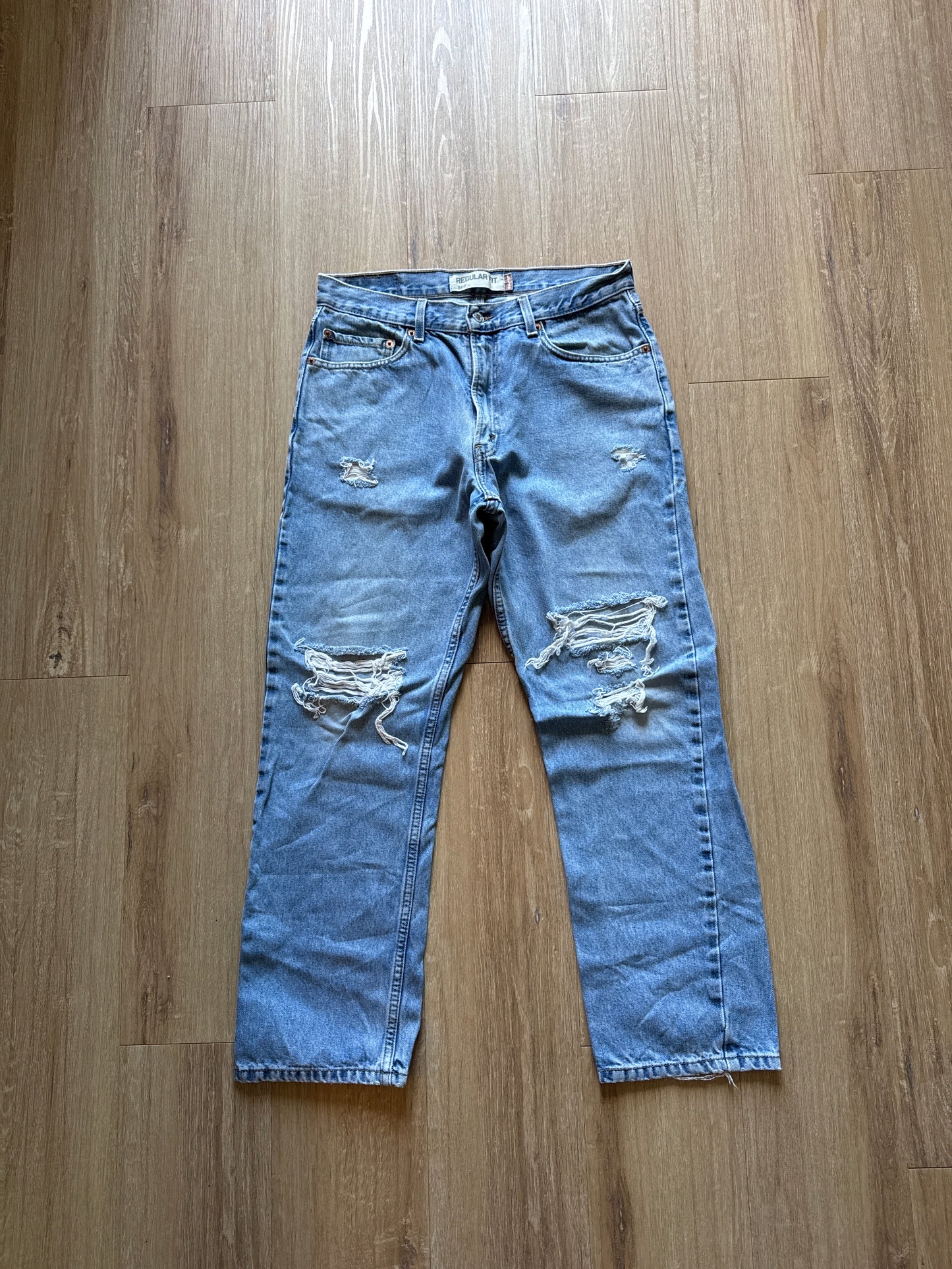 Levi’s 505 Regular Fit Distressed Light Washed Blue Denim Jeans