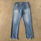 Vintage Levi’s 501 Distressed Denim Jeans