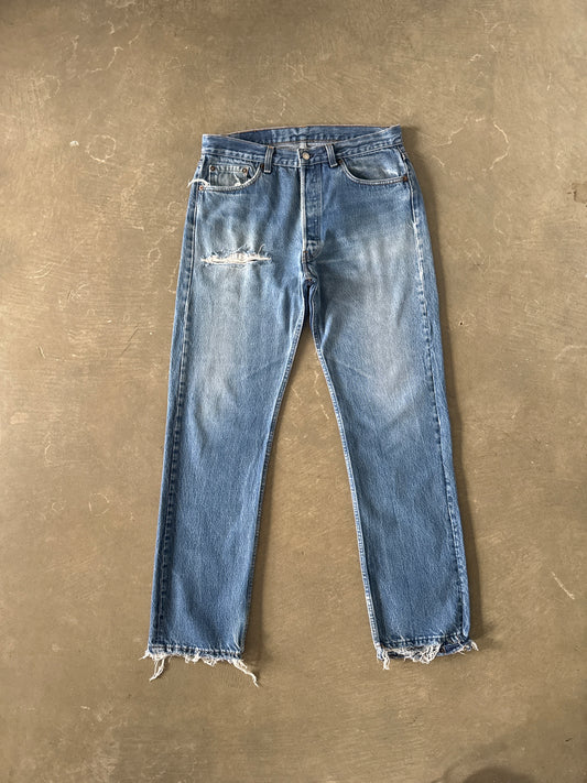Vintage Levi’s 501 Distressed Denim Jeans