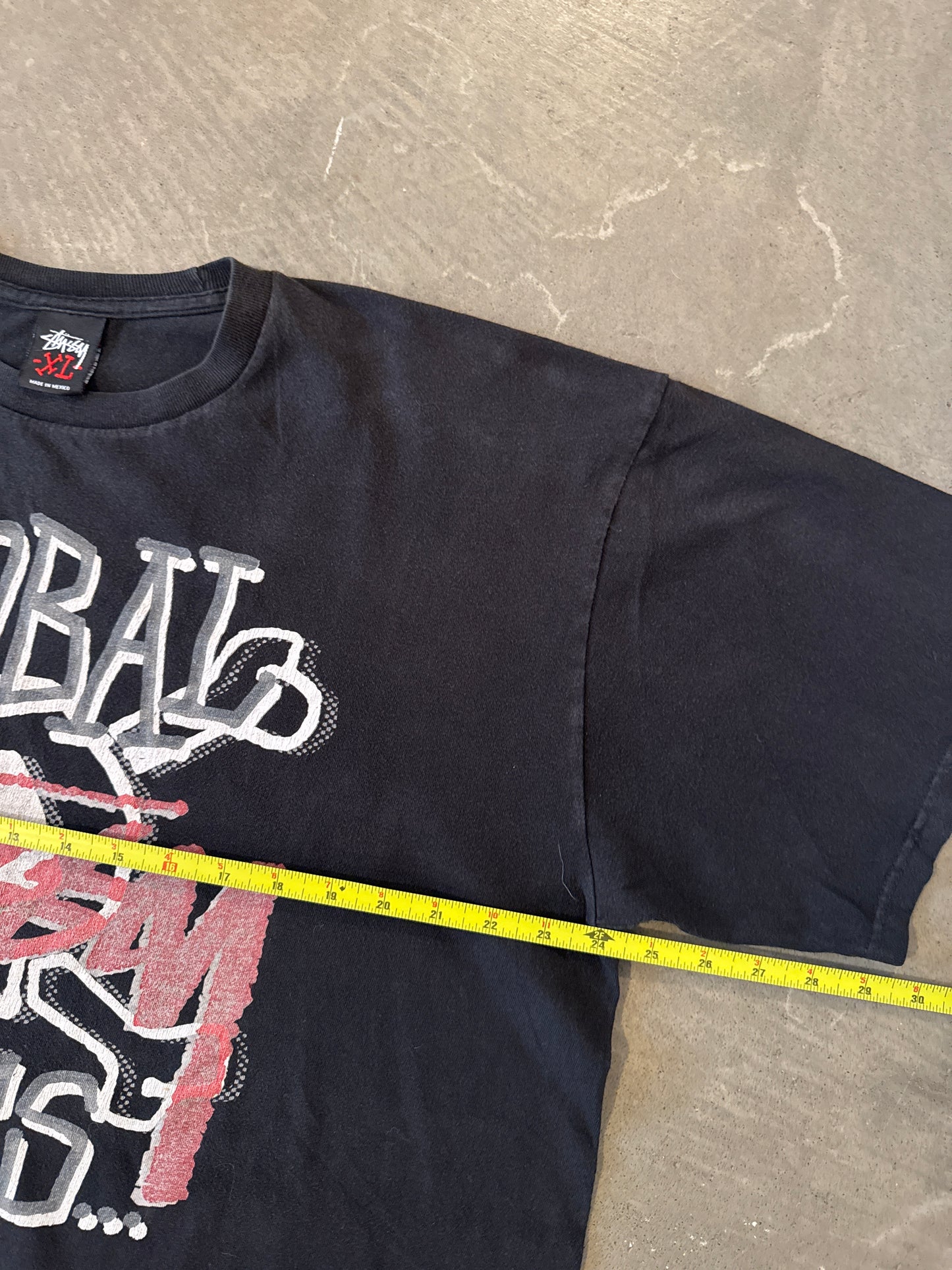 Vintage Stussy Global Roots Skull Tee
