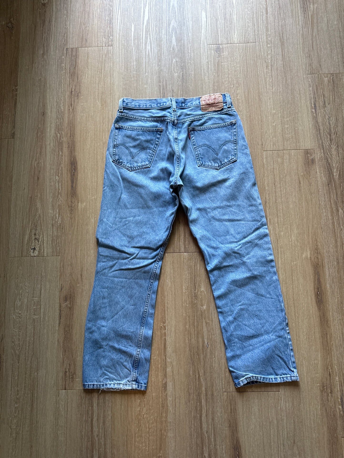 Levi’s 505 Regular Fit Distressed Light Washed Blue Denim Jeans