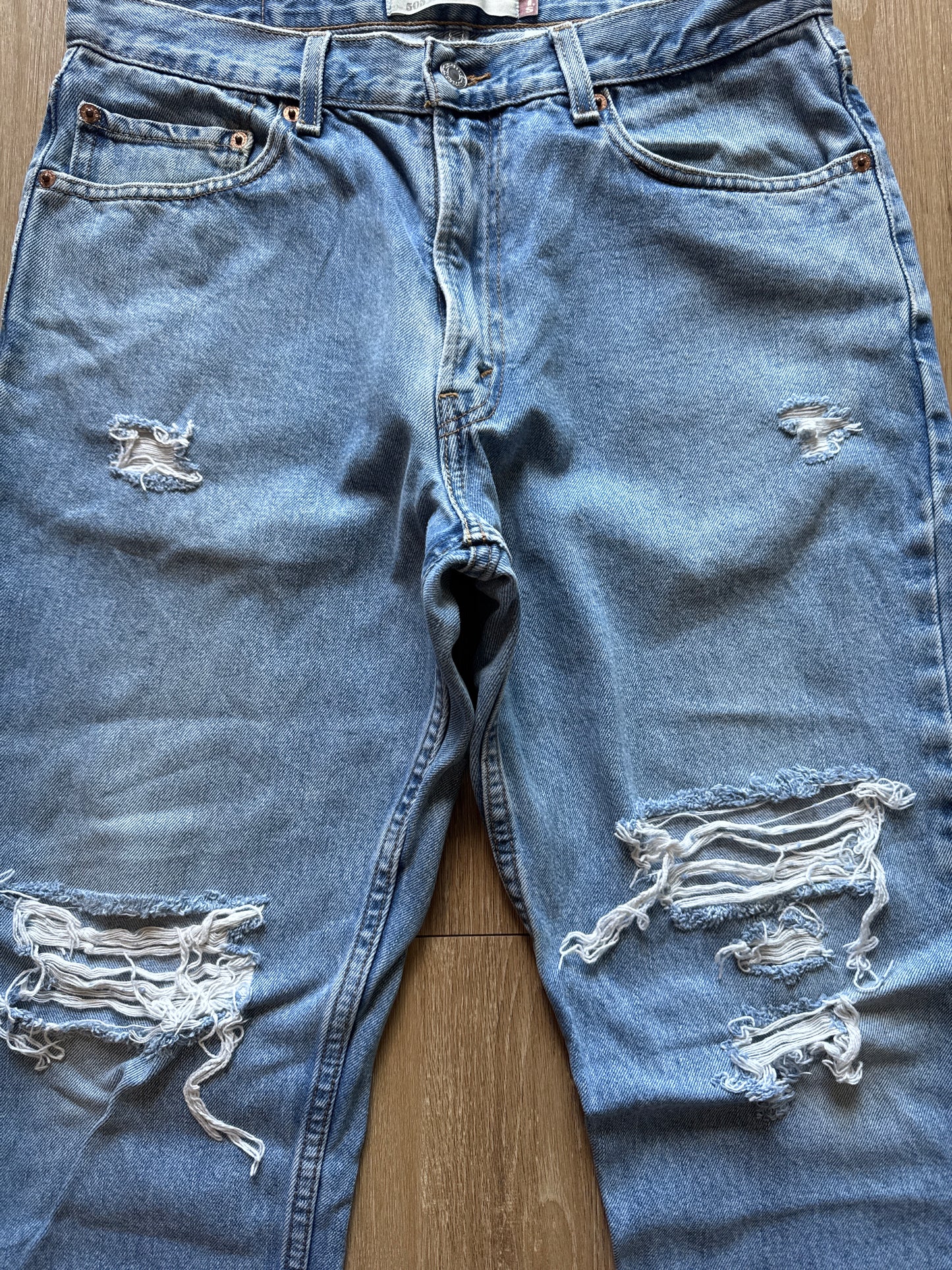 Levi’s 505 Regular Fit Distressed Light Washed Blue Denim Jeans