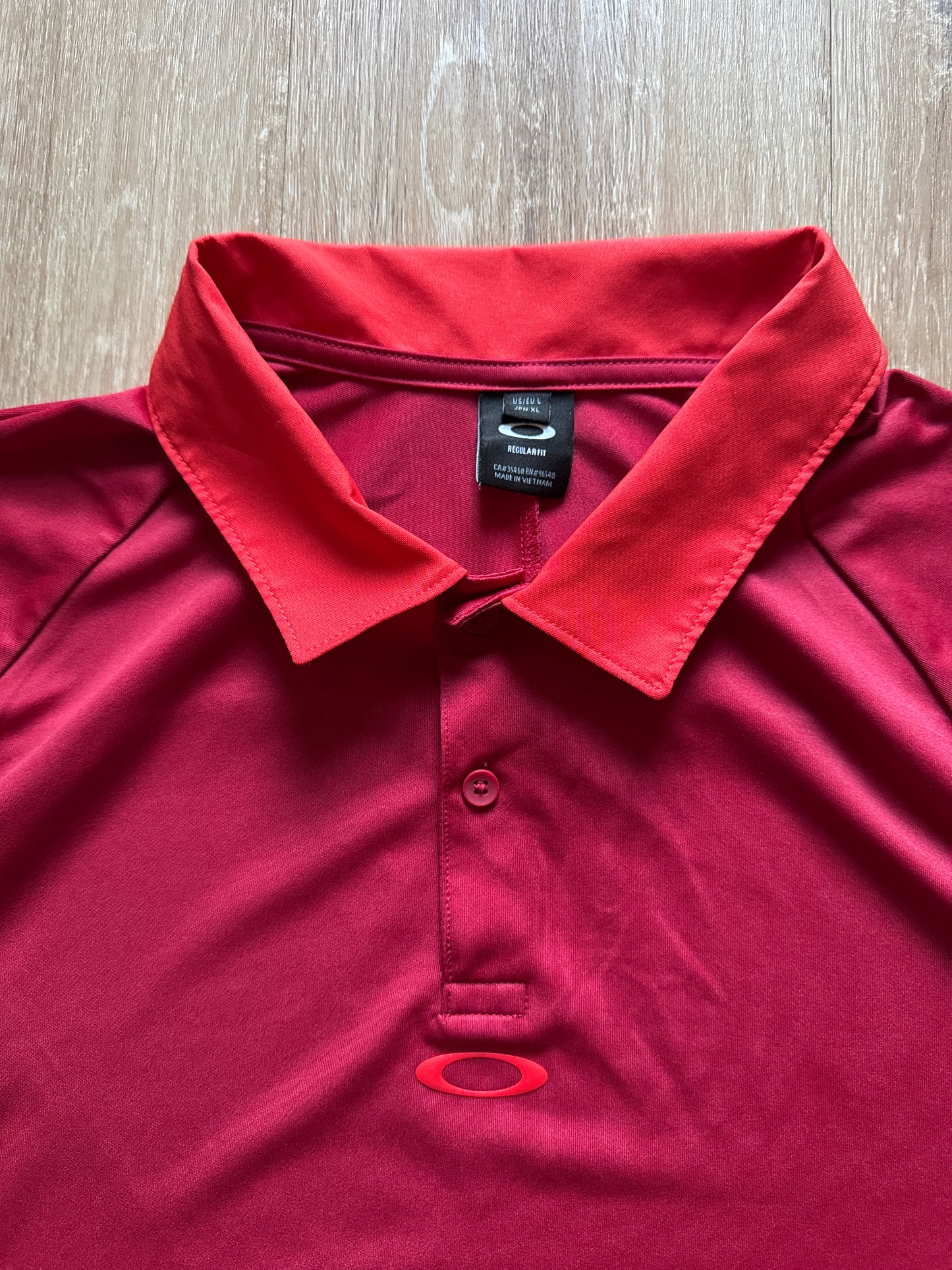 Oakley Medium Red Orange Solid Short Sleeve Performance Golf Logo Polo Shirt