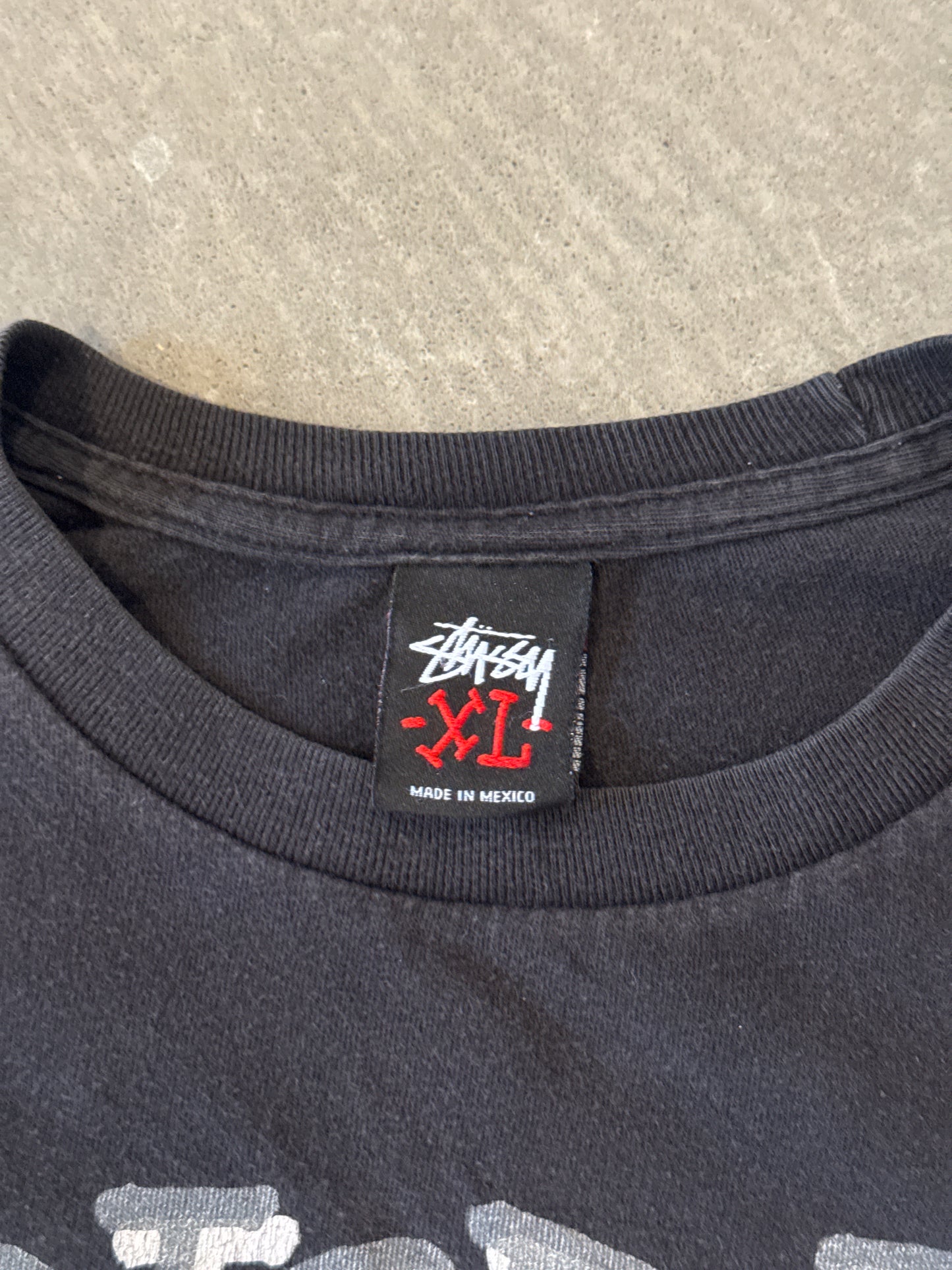 Vintage Stussy Global Roots Skull Tee