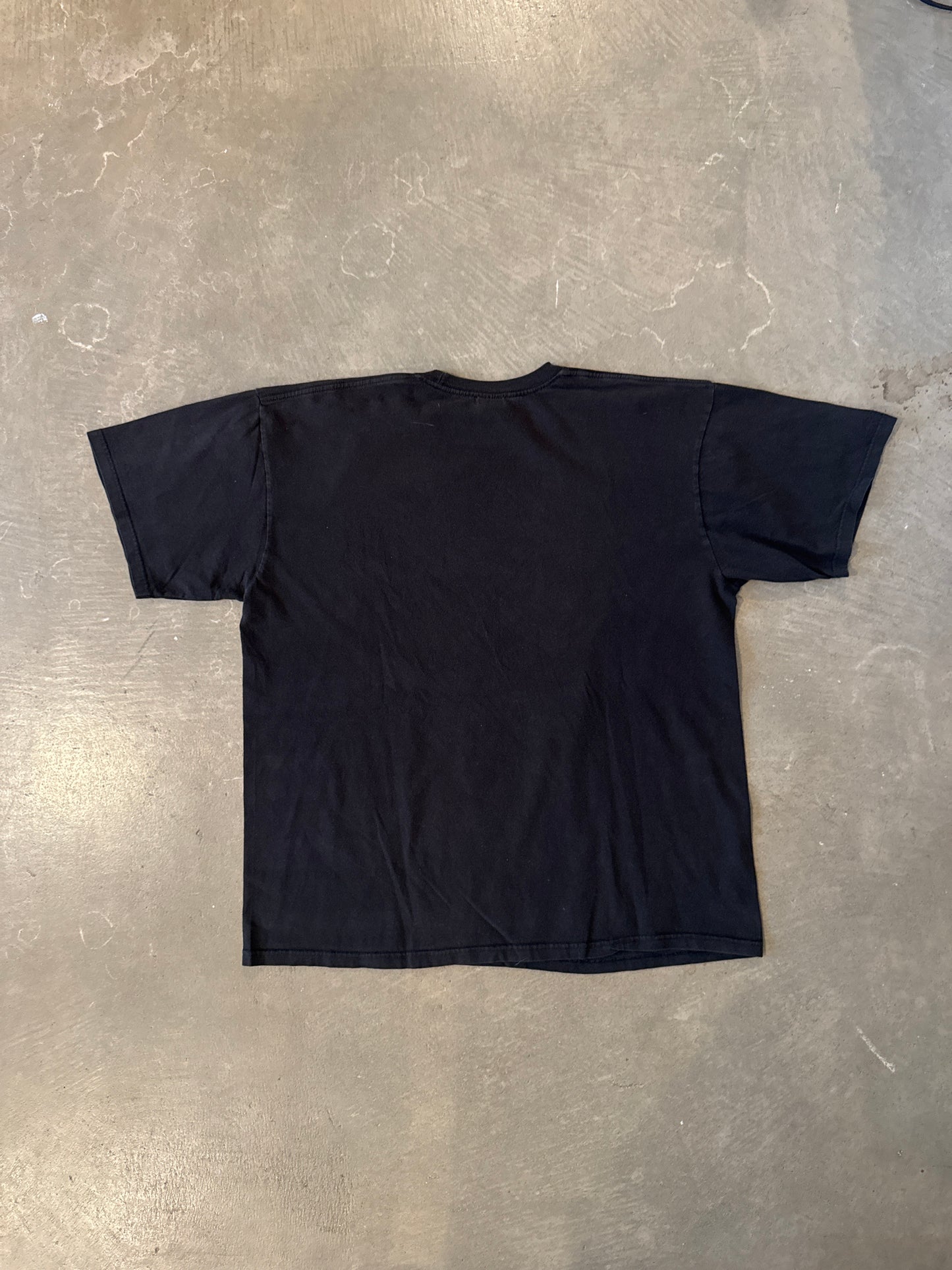 Vintage Stussy Global Roots Skull Tee