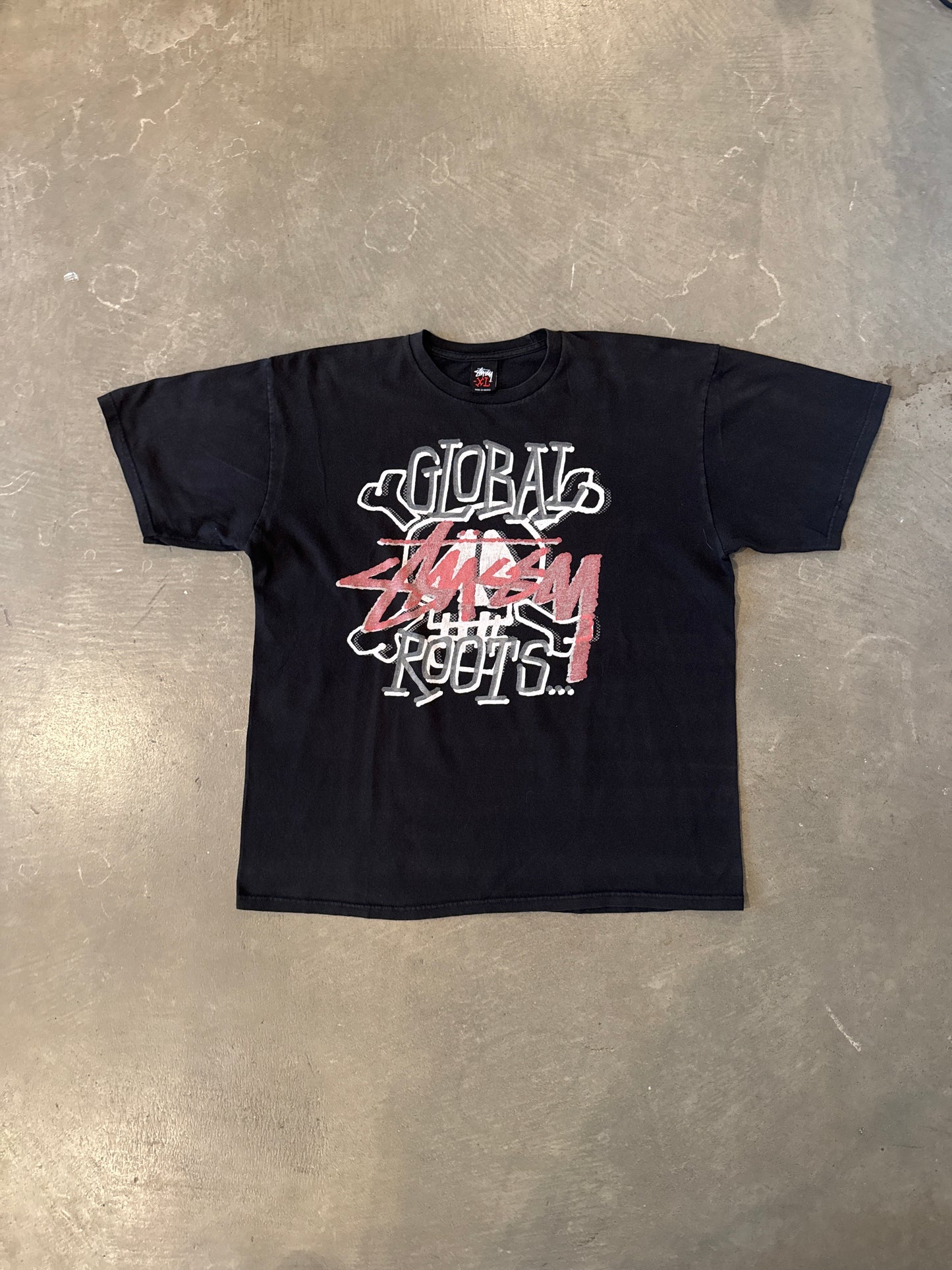 Vintage Stussy Global Roots Skull Tee